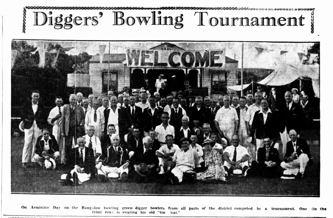 Newspaper photo: a large group of bowlers in front of a WELCOME sign